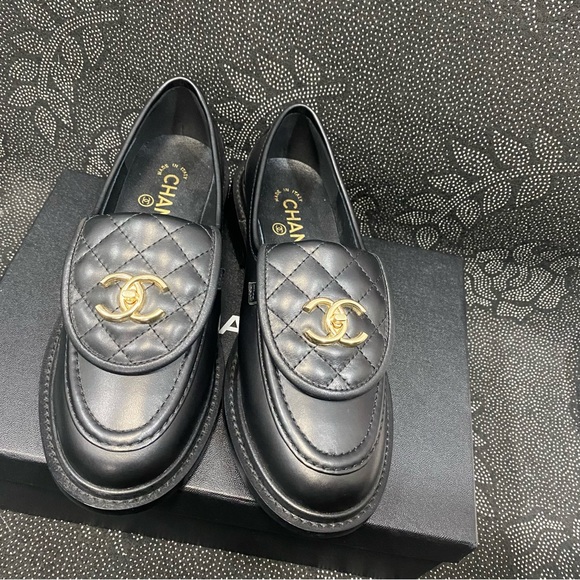 Shoes - Chanel Black Quilted Loafers with Gold Logo